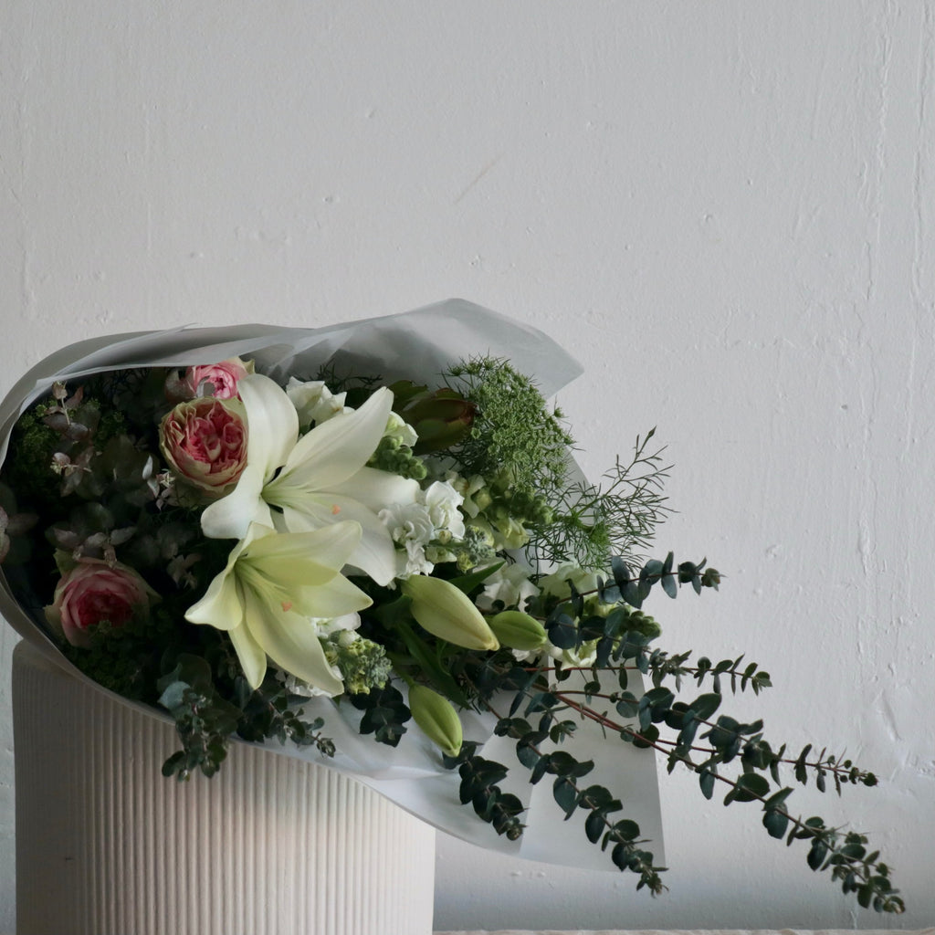 Bendigo Florist wrapped bouquet white, green and pink flowers. Seasonal fresh, sustainable florist Bendigo. Delivering across Bendigo. 